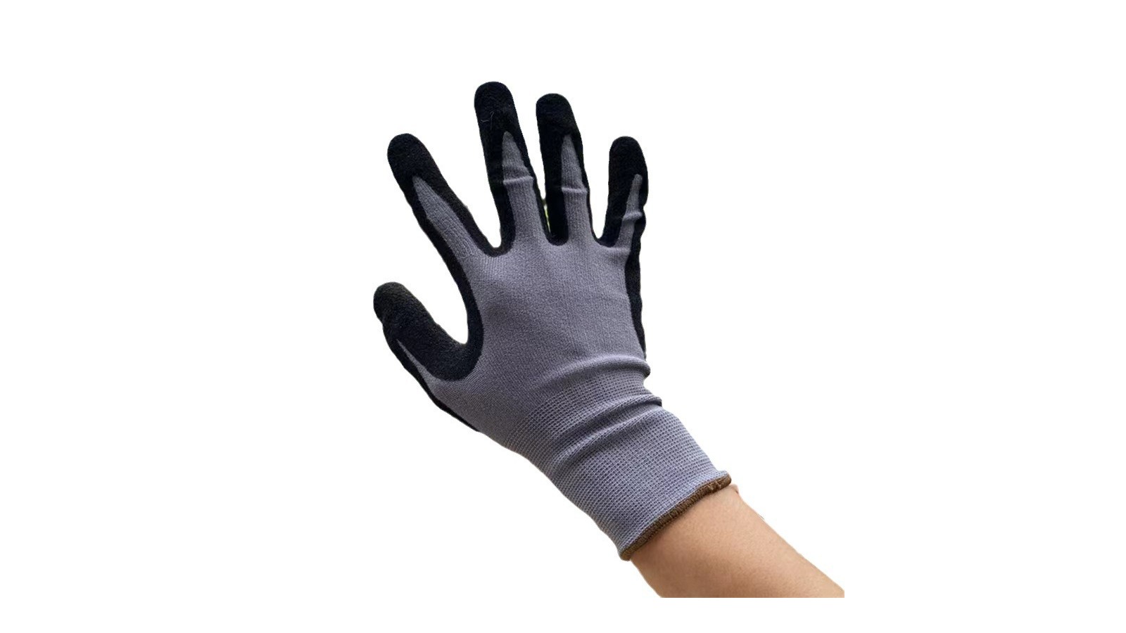 Grey knit glove with black coated palm and fingers, single glove on white