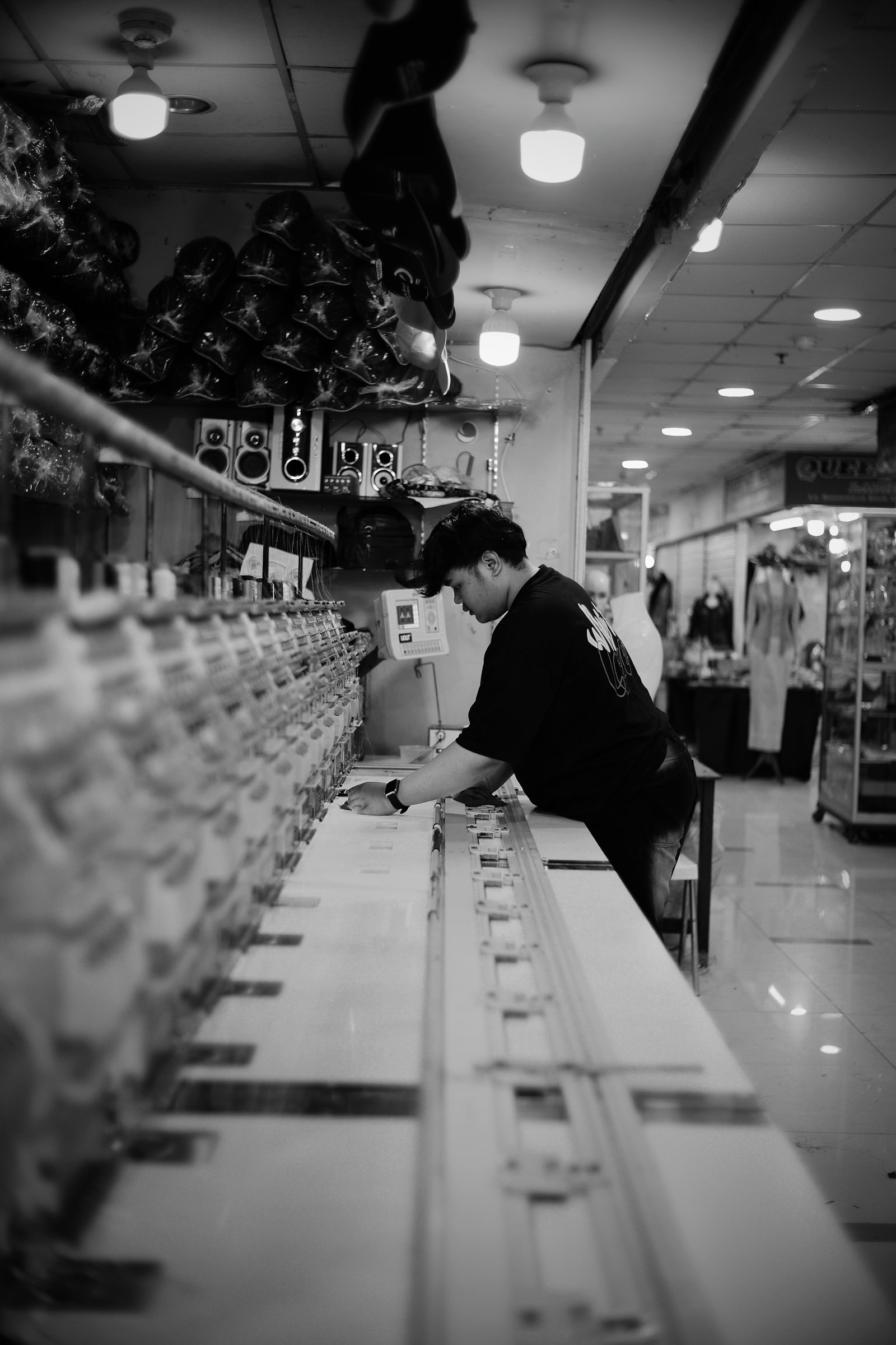 Knitting machine operator on a garment production floor